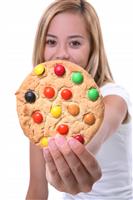 Girl Holding Cookie stock photo