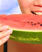 Woman Eating Watermelon stock photo