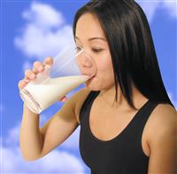 Woman Drinkng Milk stock photo
