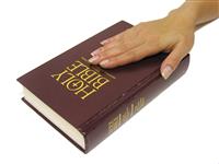 Swearing on the Bible stock photo