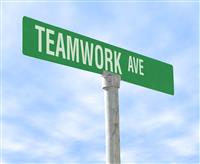 Teamwork Themed Street Sign stock photo