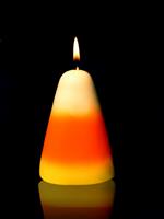 Candy Corn Candle stock photo