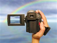 Filming a Rainbow stock photo