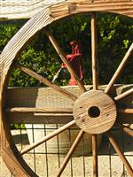 Wooden Wheel and Pump stock photo