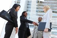 Diverse Business Team Handshake stock photo