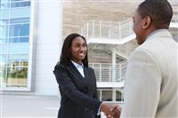 African Business Team Handshake stock photo
