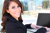 Pretty Woman on Laptop Computer stock photo