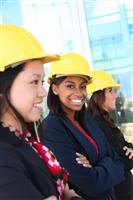 Diverse Woman Construction Team  stock photo