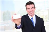 Business Man with Card stock photo