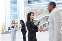Diverse Business Team Handshake stock photo
