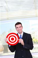 Business Man Holding Target stock photo