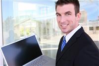 Business Man with Laptop stock photo