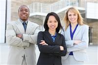 Ethnic Business Team  (Focus on middle woman) stock photo