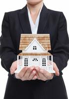 Woman Holding New Home stock photo
