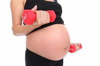 Pregnant Woman Working Out stock photo