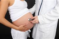 Doctor and Pregnant Woman stock photo