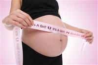 Pregnant Woman with Girl stock photo