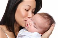 Mother Holding Young Son stock photo