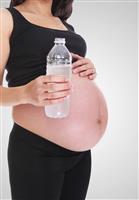 Pregnant Woman with Water stock photo