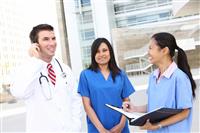 Doctor and Nurses at Hospital stock photo