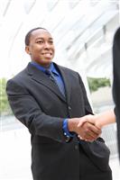 African Business Man Handshake stock photo