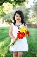 Cute Girl with Flowers stock photo