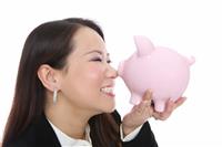 Woman Holding Piggy Bank  stock photo