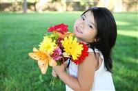Cute Girl with Flowers stock photo