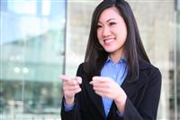Pretty Asian Business Woman Pointing stock photo