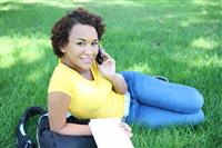 Pretty African American On Cell Phone stock photo
