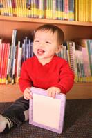 Young Boy in Library stock photo