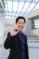Asian Business Man (Focus on Hand) stock photo