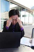 Stressed Asian Business Man stock photo