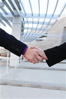 Business deal handshake stock photo