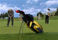 Golf Scene (Focus on Golf Bag) stock photo