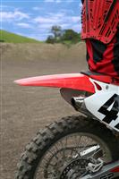 Dirt Bike Rider on Track stock photo