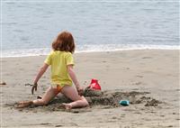 Girl on Beach stock photo
