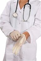 Doctor putting on gloves stock photo