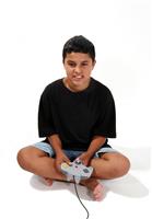 Boy Playing Video Game stock photo