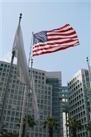Flag and Corporate Building stock photo