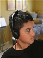 Boy Listening to Music stock photo