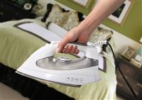 Ironing in the Bedroom stock photo