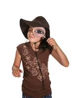 Girl with Magnifying Glass stock photo