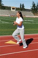 Young Woman Running Laps stock photo