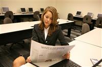 Woman Reading Newspaper stock photo