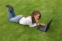 Young Woman with Laptop stock photo