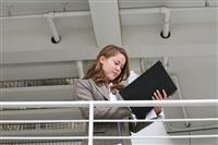 Business Woman Reviewing Notes stock photo