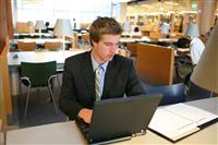 Business Man in Library stock photo