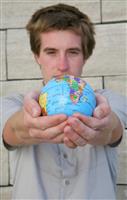 Man Holding Globe stock photo