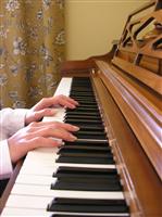 Woman Playing the Piano stock photo